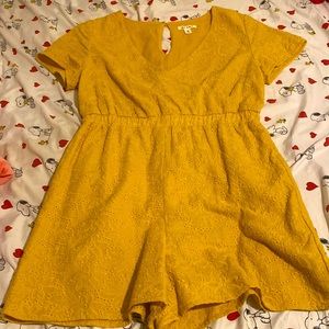 Selling a Tanishu gold romper for $40